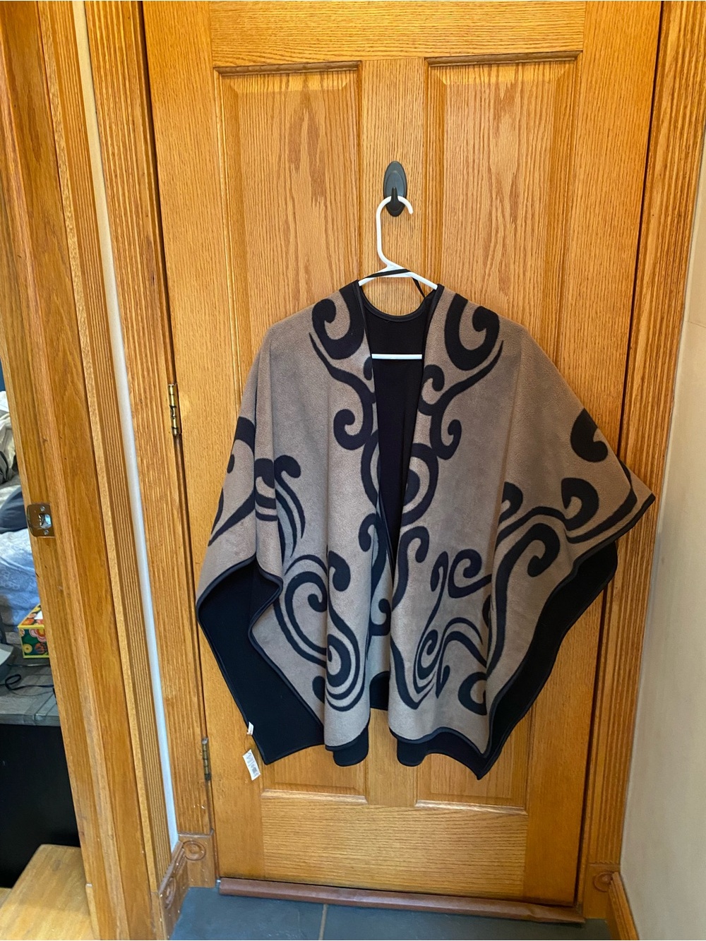 Brown & Black Swirl Pattern Poncho
Nicole’s boutique